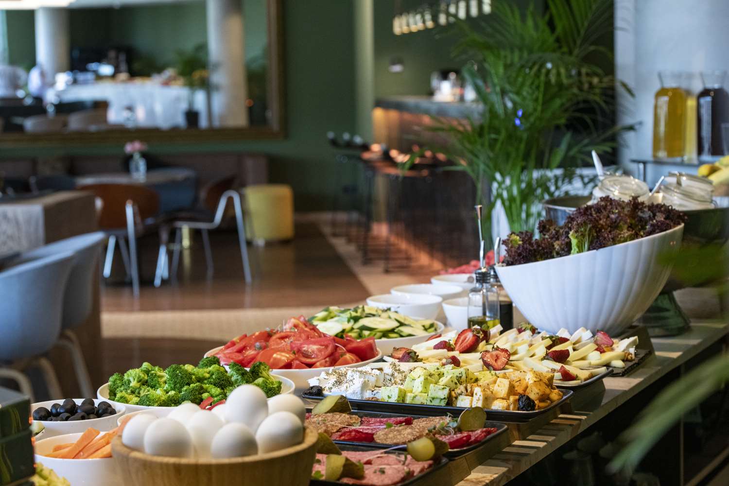 Fresh buffet spread with vegetables and cheeses at TITA Restaurant